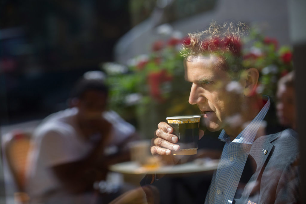 Kurt Rosentreter drinking coffee in downtown Toronto