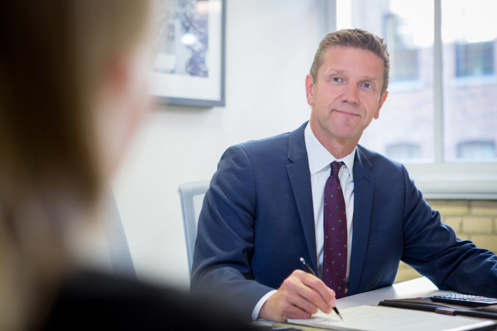 Kurt Rosentreter in a meeting with a client